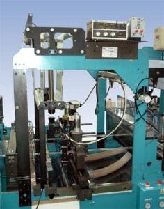 automatic bottom tape punch positioning unit